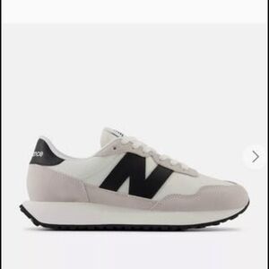 New Balance Classic White and Black Sneakers 237